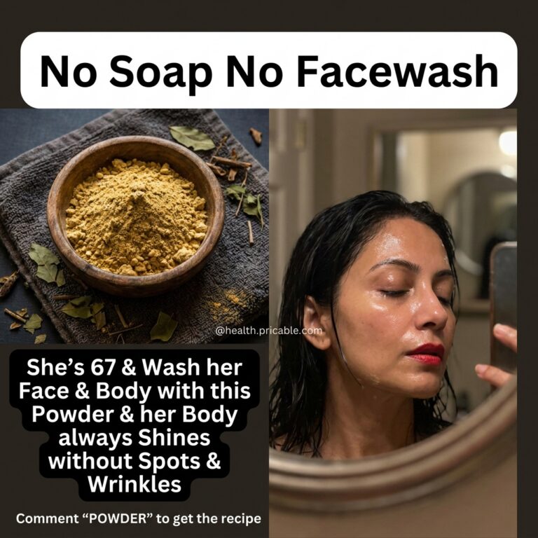 A wooden bowl filled with a fine yellow-beige cleansing powder surrounded by dried natural elements like rose petals and