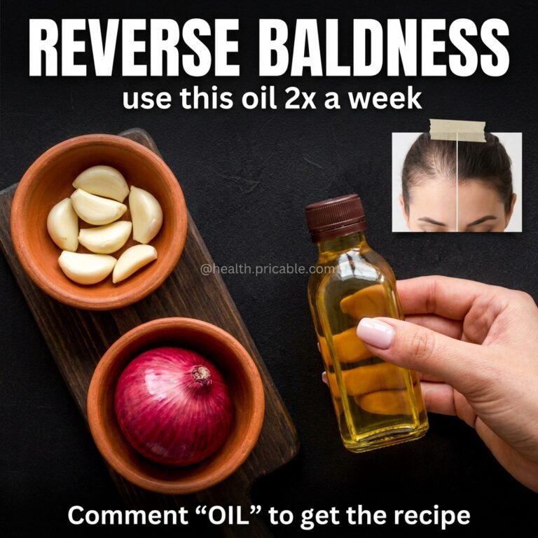 A top-down flat lay of fresh garlic cloves and a red onion on a wooden cutting board ready to be prepared for a DIY hair
