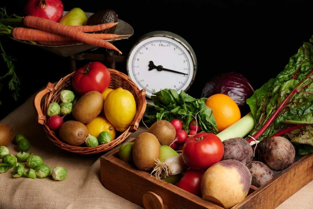 A balanced plate with nutrient-dense foods like colorful vegetables lean protein and whole grains next to a contrasting