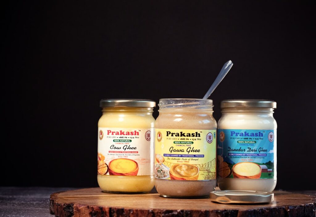 A vibrant collection of small jars of gourmet flavored mayonnaise showcasing various colors and textures suggesting diff