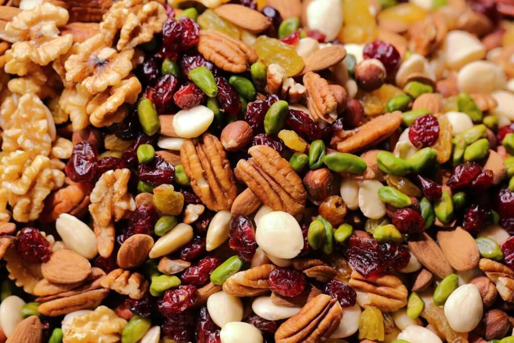 An assortment of various nuts almonds walnuts cashews in a bowl