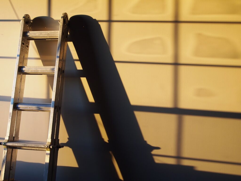 A diagram showing a ladder leaning against a wall forming a right-angled triangle The vertical side wall is labeled 40m 