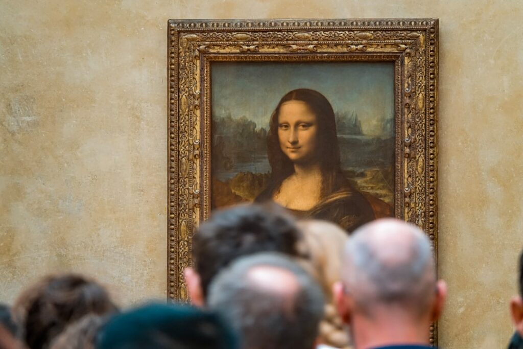 A close-up of Leonardo da Vinci s Mona Lisa painting focusing on her enigmatic smile
