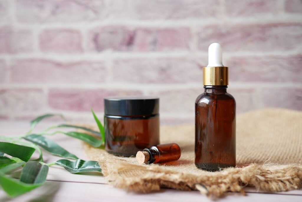 An infographic showcasing various DIY baby oil skincare recipes with small bottles of baby oil and natural ingredients l