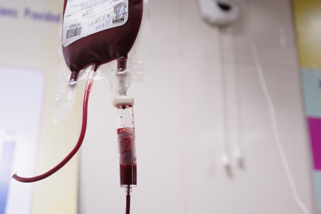 A vibrant engaging graphic with a question mark and a blood drop icon signaling a health quiz related to blood types and