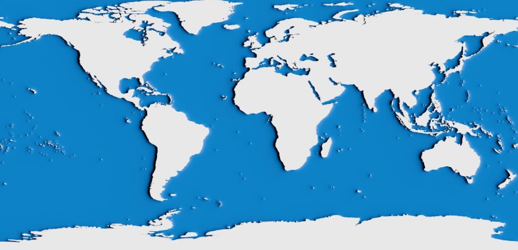 A vibrant and educational infographic displaying various world geography facts such as the largest country deepest ocean