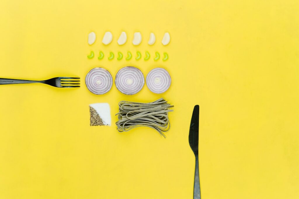 A vibrant and organized flat lay of healthy meal prep containers showing a balanced gym diet with protein carbs and vege