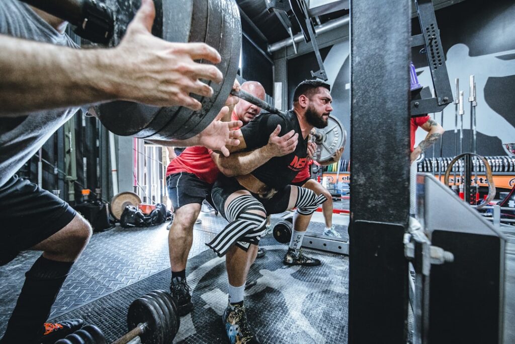 An energetic person lifting weights in a gym looking strong and focused symbolizing muscle gain and fitness achievements