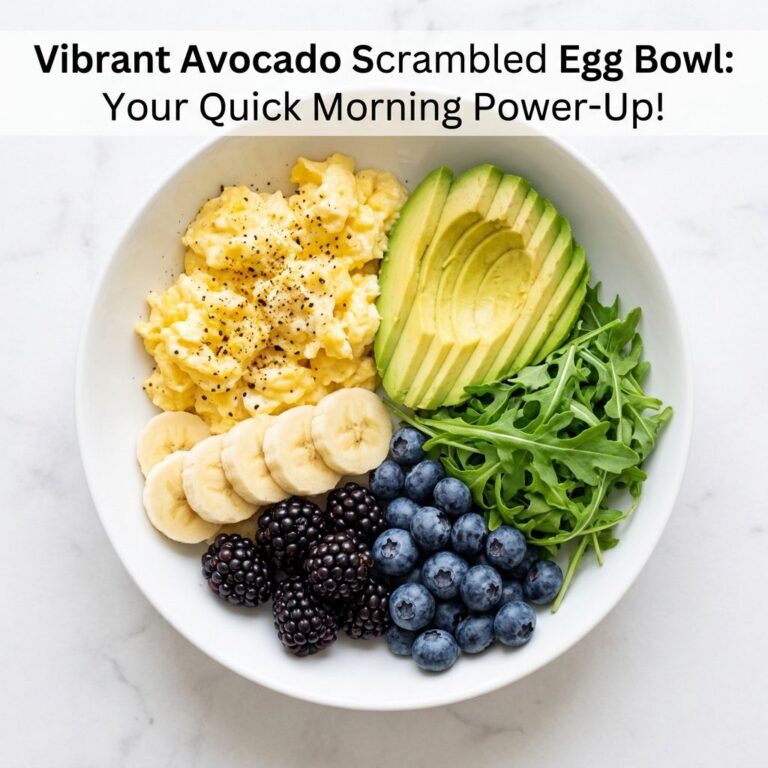 A vibrant breakfast bowl featuring scrambled eggs fanned avocado slices fresh arugula sliced bananas blackberries and bl