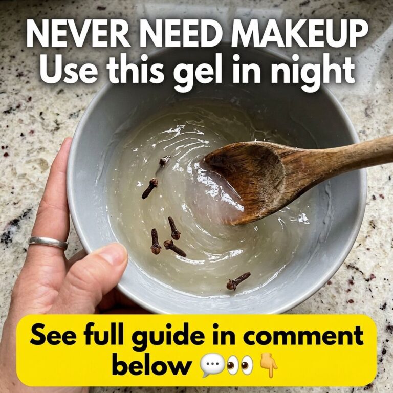 A close-up overhead shot of a light grey bowl containing a translucent viscous gel with whole cloves with a wooden spoon