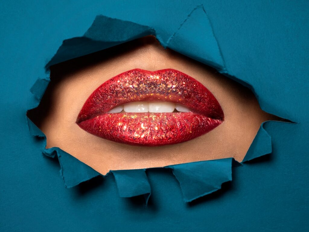Close-up of smooth plump and hydrated lips after using a lip scrub showing a healthy appearance
