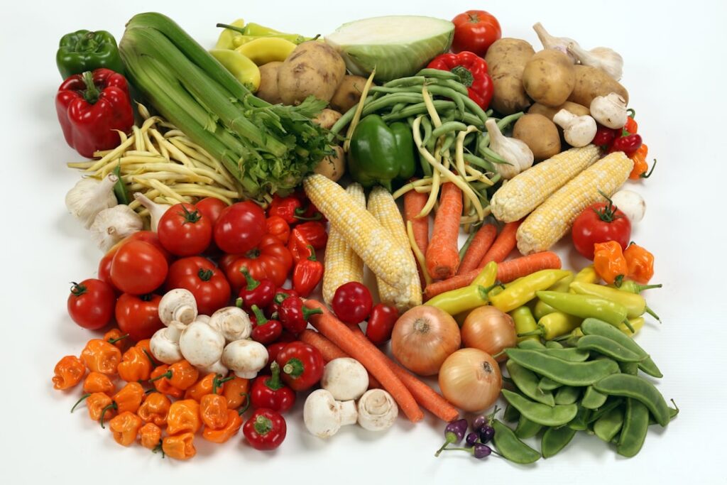 A variety of starchy vegetables and fruits commonly used for muscle gain such as sweet potatoes bananas rice and oats di