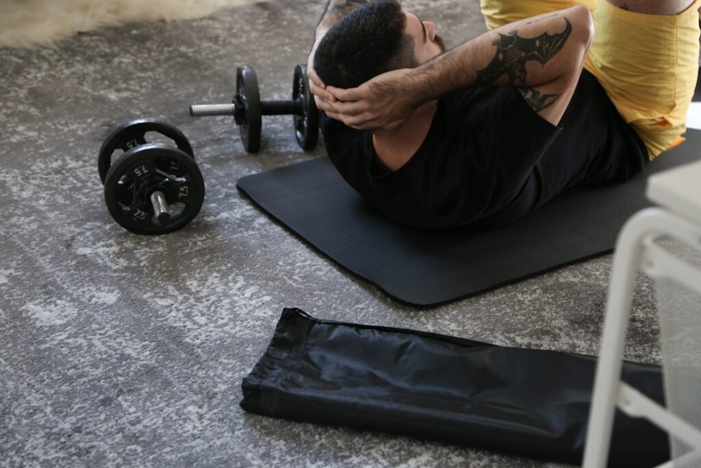 A person performing a core exercise like a plank or crunch with good form demonstrating strength and focus