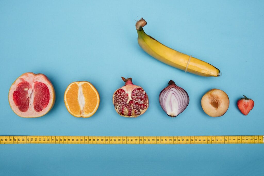 An infographic showing different carbohydrate foods with their 100kcal portion sizes clearly labeled Examples include ap