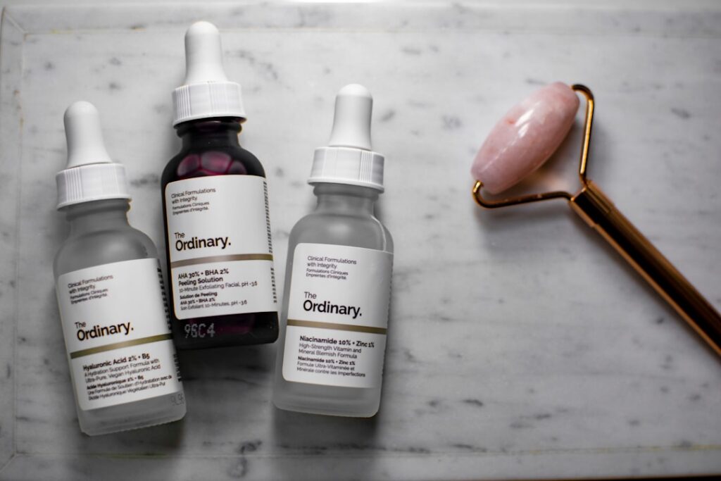 Assortment of different skincare serum bottles with dropper applicators representing various active ingredients