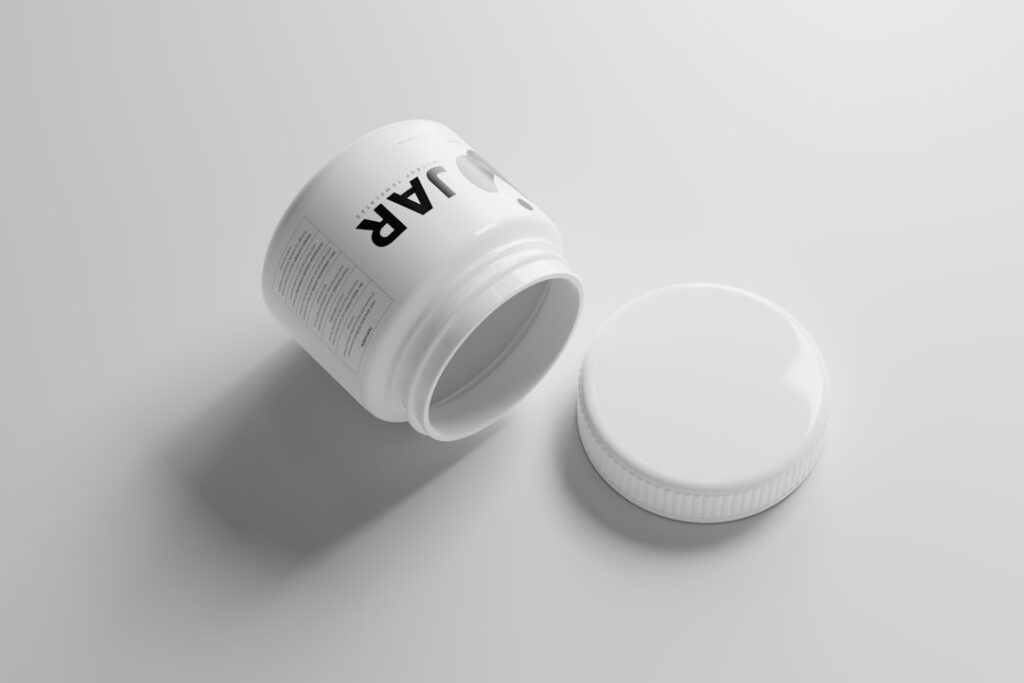 Close-up of a small clean jar containing the freshly mixed Vaseline and Vitamin E balm