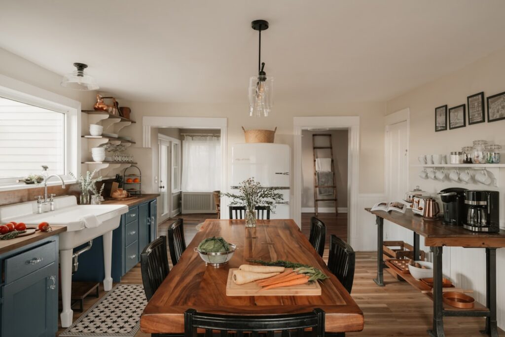 A vibrant overhead shot of a kitchen counter filled with an assortment of colorful whole foods like fresh fruits leafy g