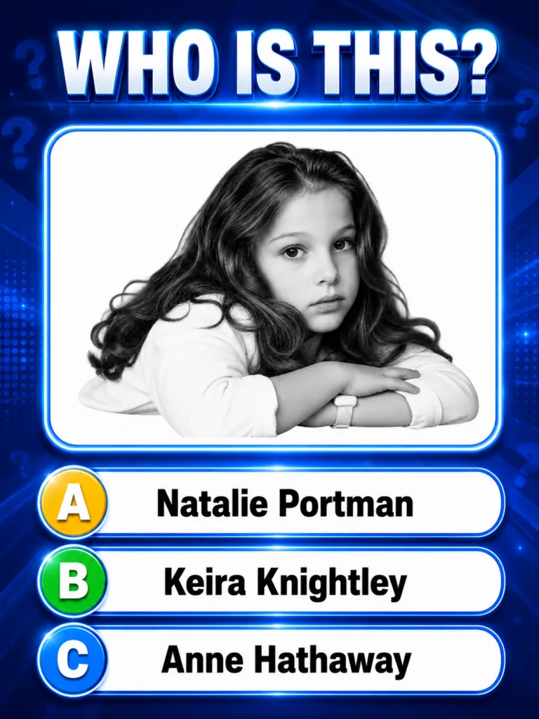 A black and white portrait of a young Natalie Portman with long wavy hair and a serious expression as seen in the quiz S