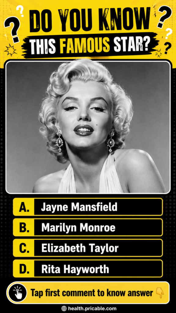 A black and white portrait of Marilyn Monroe smiling slightly with her beauty mark visible wearing teardrop earrings and