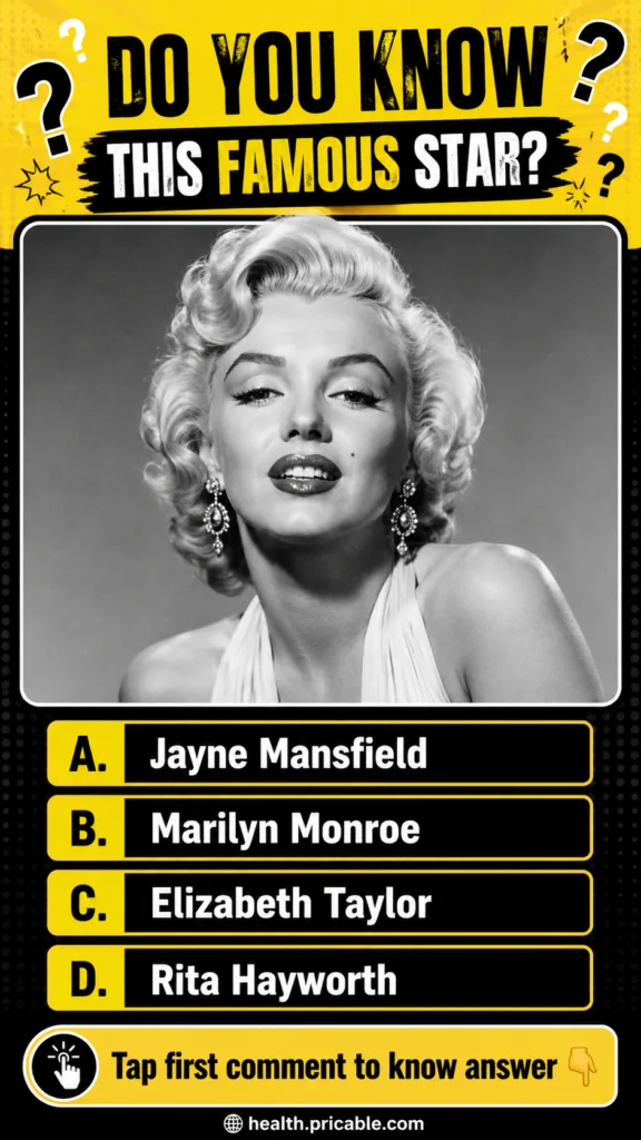 A black and white portrait of Marilyn Monroe smiling slightly with her beauty mark visible wearing teardrop earrings and