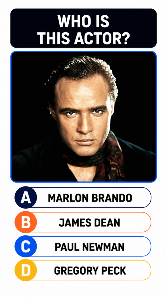 A striking colorized portrait of a man identified as Marlon Brando with slicked-back dark hair an intense and direct gaz