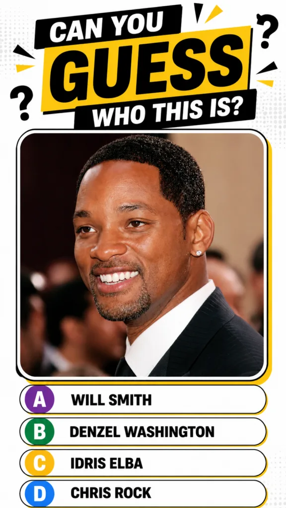 A headshot of Will Smith smiling wearing a dark suit with a white shirt and a diamond stud earring The image is bright a