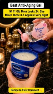 A woman with glowing radiant skin gently touching her face suggesting a youthful appearance achieved through a nightly r