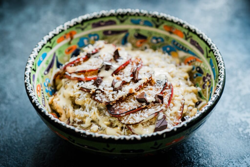 Close-up of finely grated red onion in a small bowl ready for mixing
