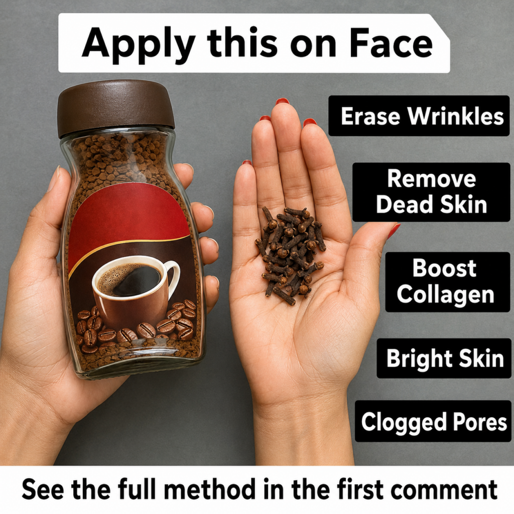 Two hands holding a glass jar of instant coffee granules and a small pile of dried cloves against a dark grey background