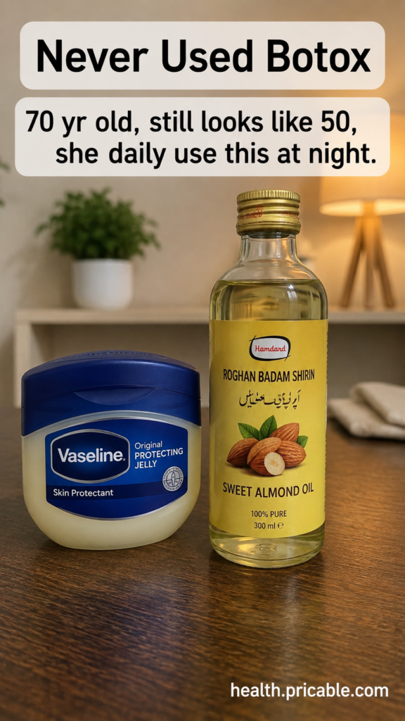 Two skincare products a jar of Vaseline Original Protecting Jelly and a bottle of sweet almond oil on a dark wooden surf