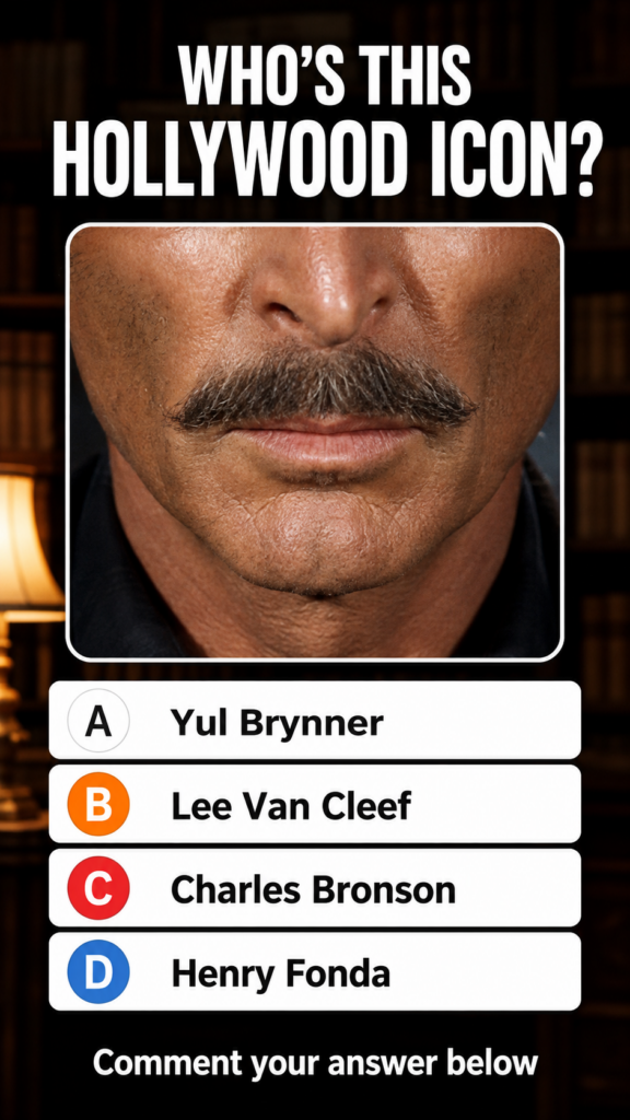 A tightly cropped close-up of Charles Bronson s face focusing on his nose mouth and a distinctive dark mustache with tan