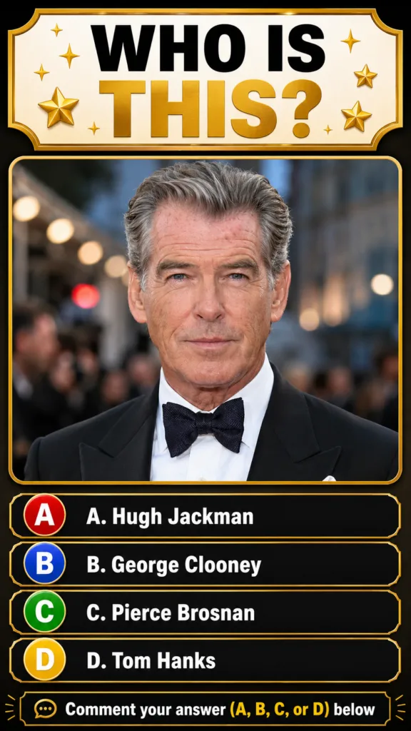 A headshot of actor Pierce Brosnan wearing a classic black tuxedo with a black bow tie and white shirt looking directly 