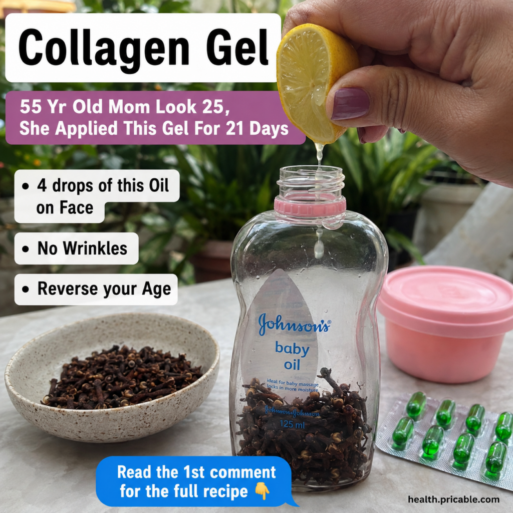 A hand squeezing a fresh lemon slice into a small bottle of baby oil already containing dried cloves with more cloves in