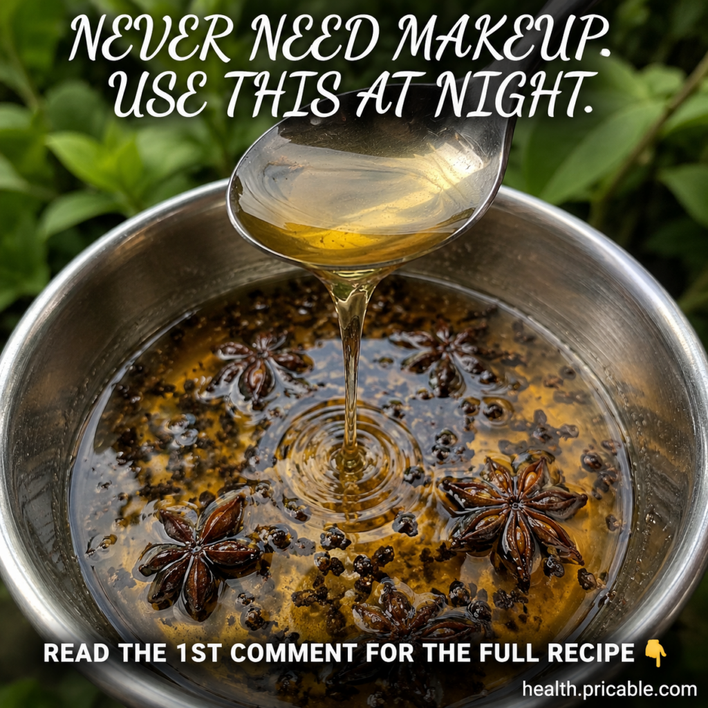A stainless steel bowl filled with a dark golden-brown liquid mixture with star anise pods and small dark granular parti