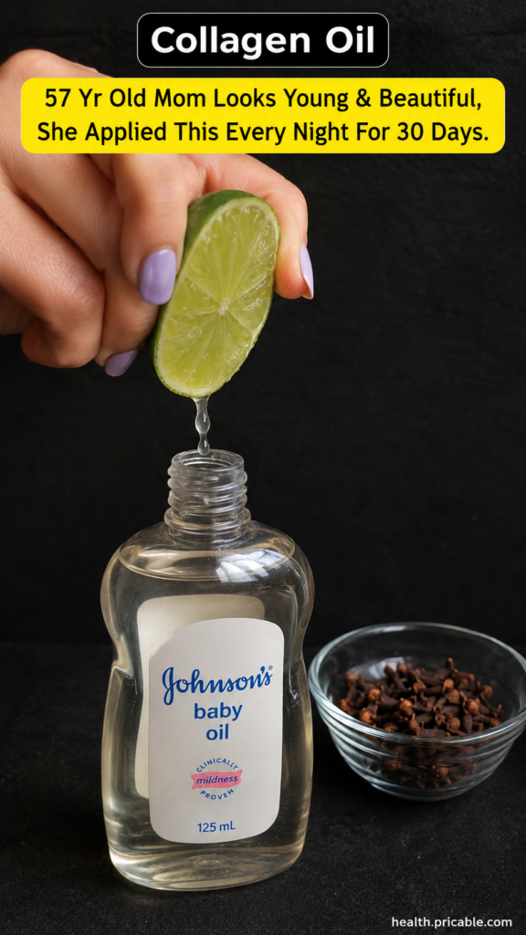 A hand squeezing a fresh lime directly into an open bottle of Johnson s baby oil with whole cloves in a small bowl nearb