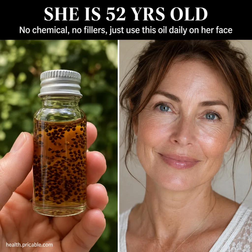 A beautiful golden natural face oil in a clear glass dropper bottle on a light clean background with some natural ingred