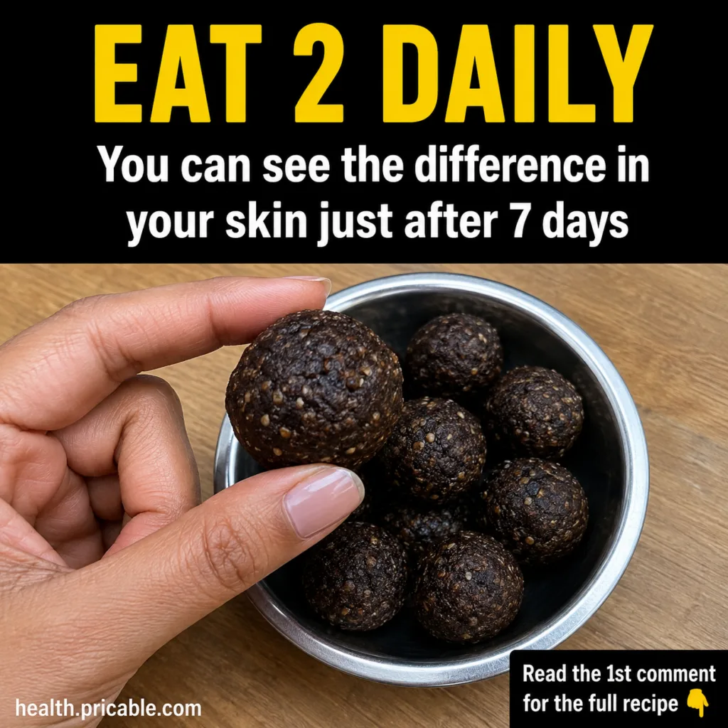 A plate of small round edible beauty laddus some sprinkled with seeds or nuts against a soft natural background They loo