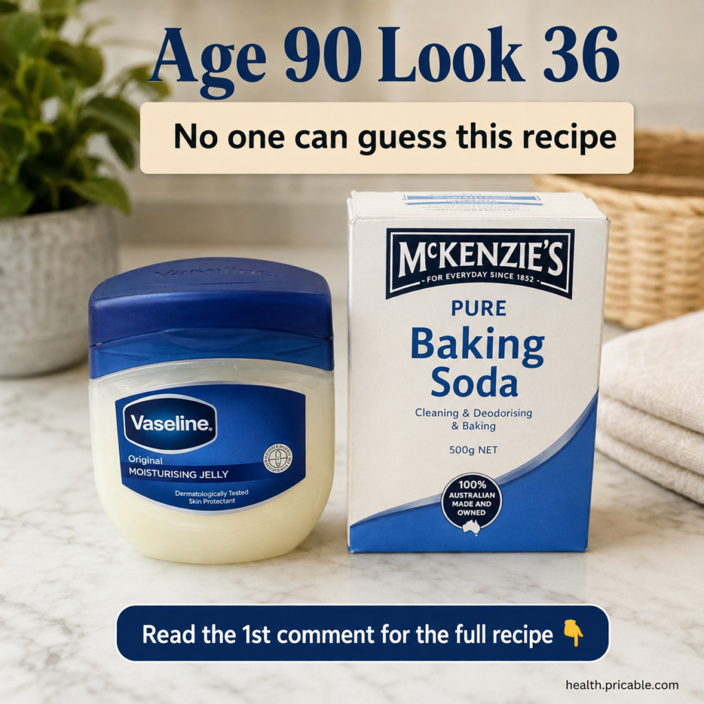 A jar of Vaseline and a box of baking soda on a clean bathroom counter with a hand mixing them into a small bowl