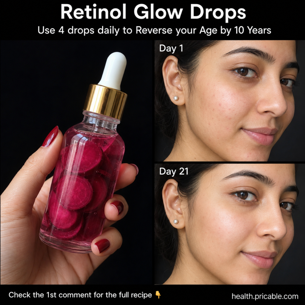 A clear glass dropper bottle with a vibrant pink beetroot-infused oil held by a hand Slices of beetroot are visible in t