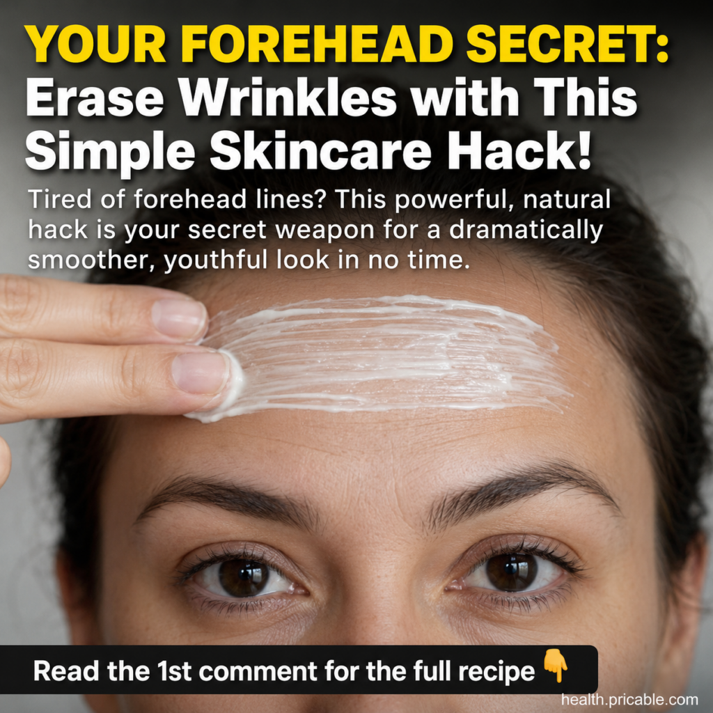 A woman applying a white thick cream to her forehead with gentle horizontal strokes focusing on reducing the appearance 