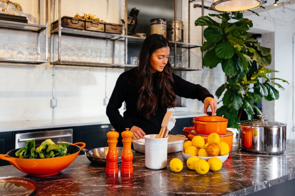 A vibrant inviting kitchen scene with a variety of colorful healthy vegan dishes laid out on a table perhaps with fresh 