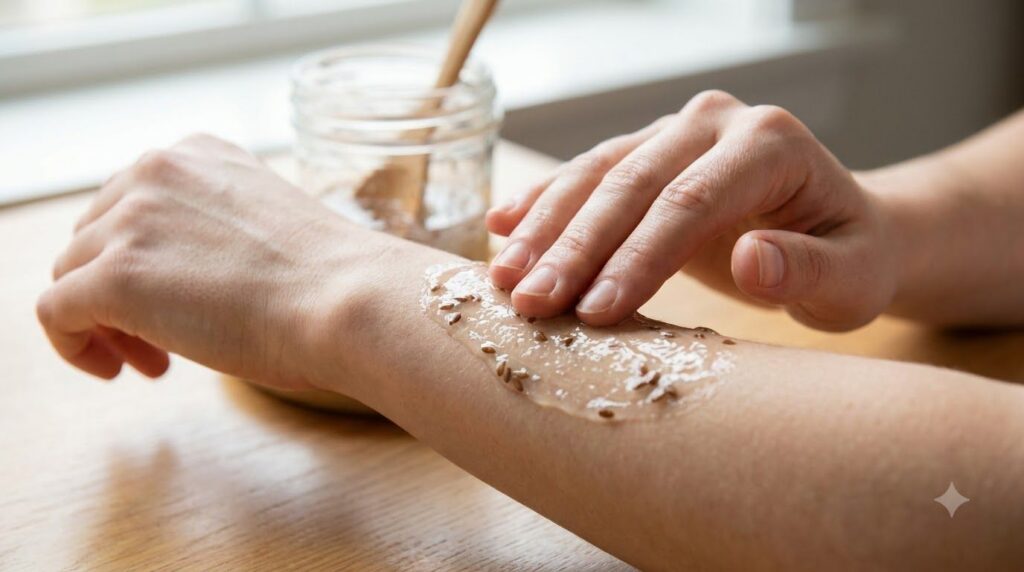 A close-up of a person s hand applying a translucent gel-like flaxseed and baby oil blend to their clean bare forearm sh