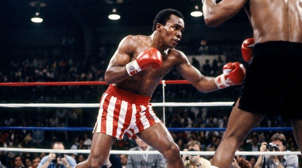 Sugar Ray Leonard in a boxing ring mid-fight or posing showing his characteristic speed and grace