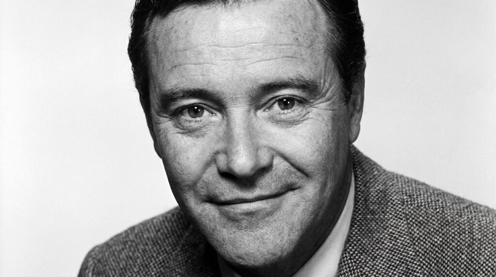 A smiling headshot of classic actor Jack Lemmon from his prime