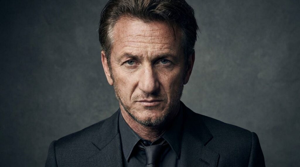 A formal portrait of Sean Penn looking serious and intense