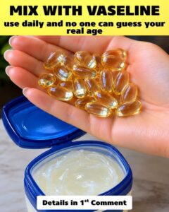 A jar of petroleum jelly like Vaseline next to a small pile of softgel beauty capsules on a clean surface