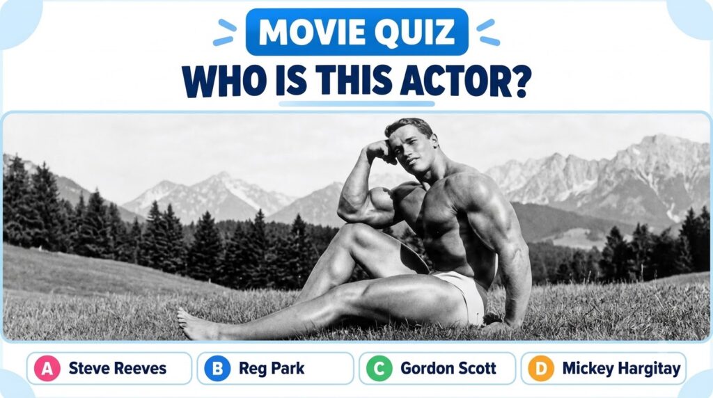 A black and white photograph of a young muscular Arnold Schwarzenegger seated outdoors posing with mountains and trees i