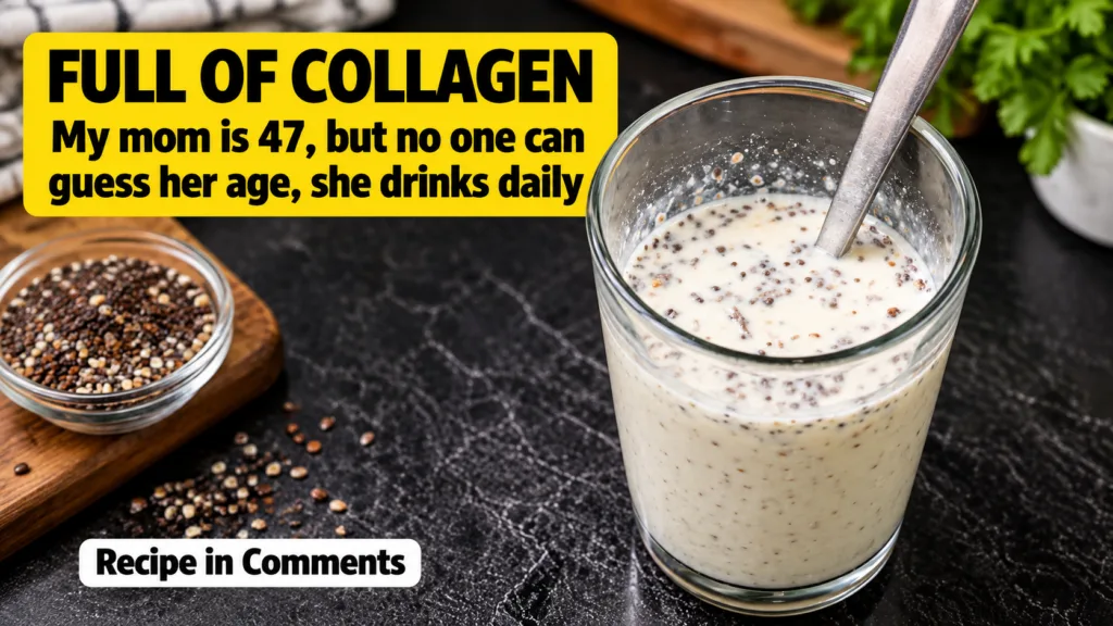 A clear glass containing a creamy light-colored beverage with numerous small dark chia seeds dispersed throughout with a