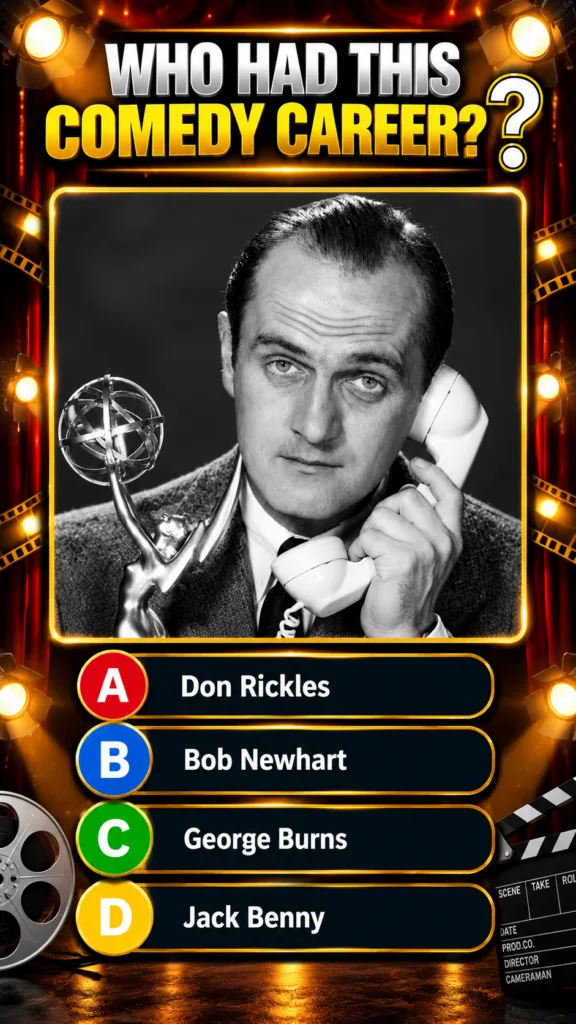 Bob Newhart in a black and white portrait holding a classic rotary telephone receiver to his ear with one hand and an Em