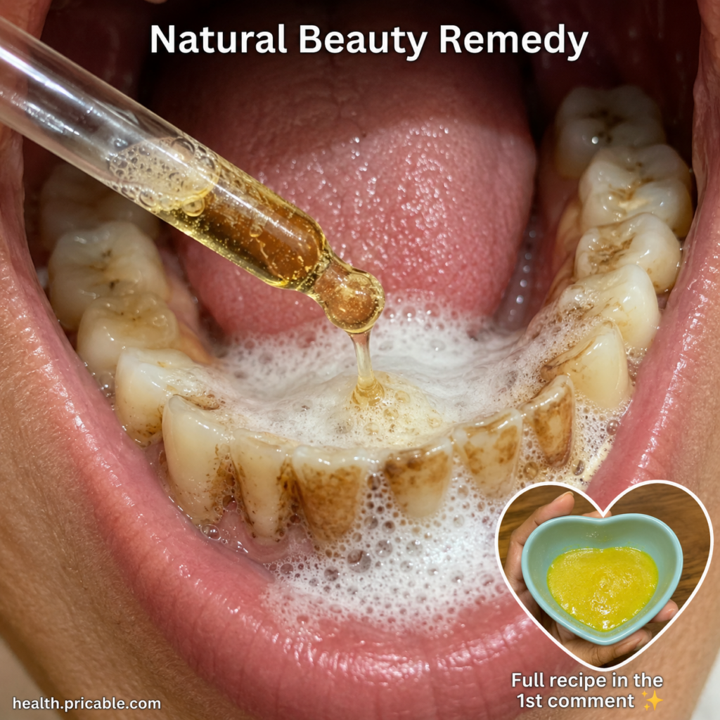 A close-up of a natural white frothy paste being gently applied to teeth with a soft toothbrush